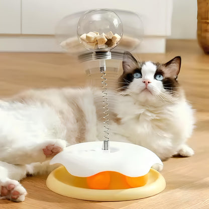 Juguete Interactivo Giratorio con Dispensador de Comida para Gatos_ejemplo